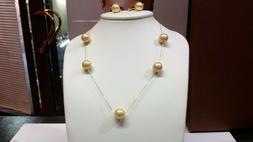 COMPLETO IN ORO GIALLO 18KT CON PERLE BAROCCHE,NUOVO A SOLI 