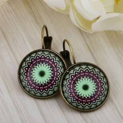 1 paio di orecchini girasole con pendente