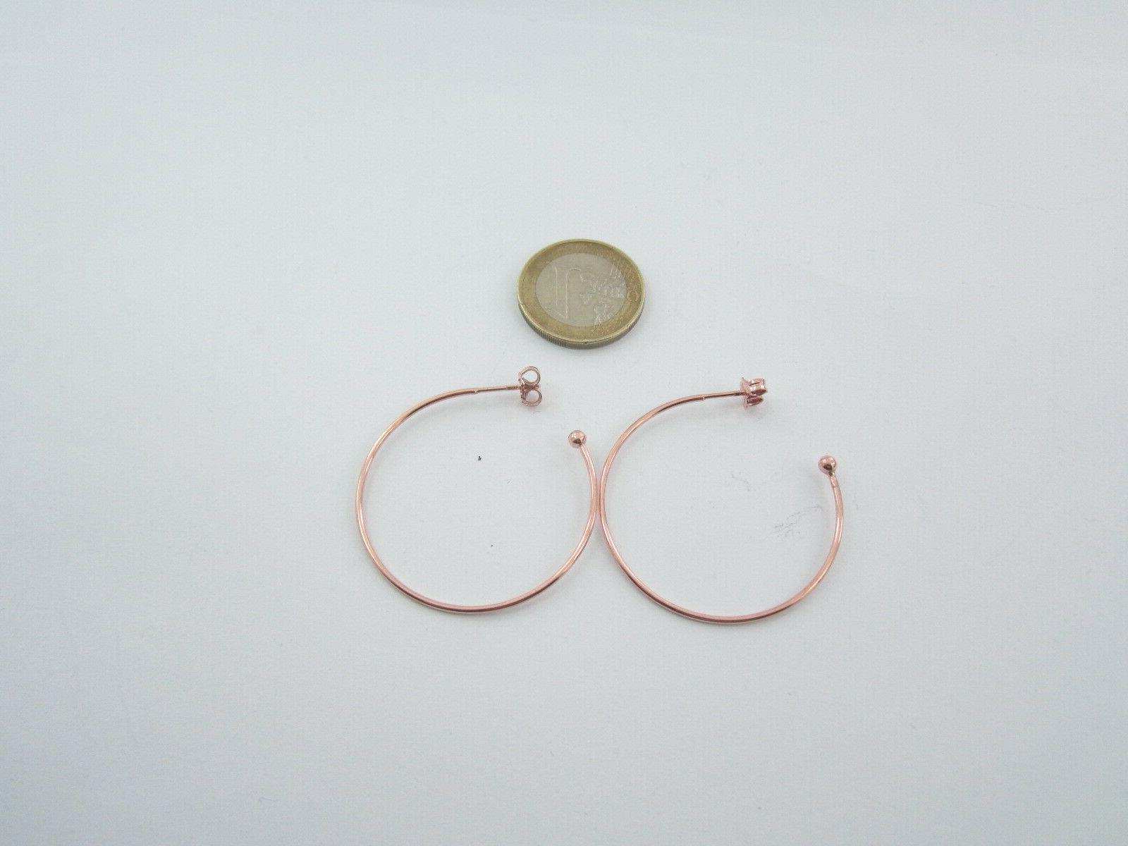 1 paio di orecchini perno semi tondo