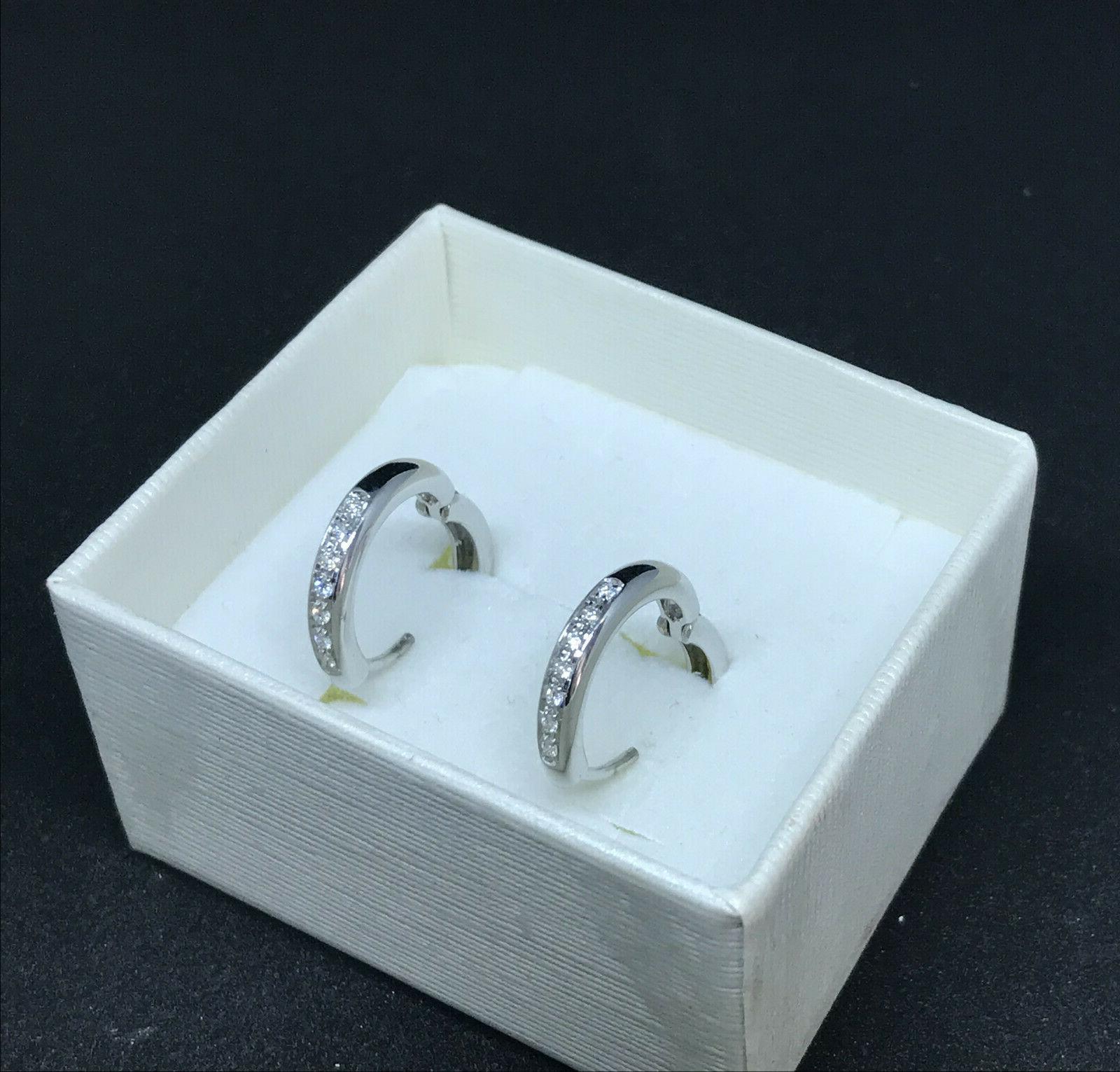 1 paio orecchini cerchio in oro bianco