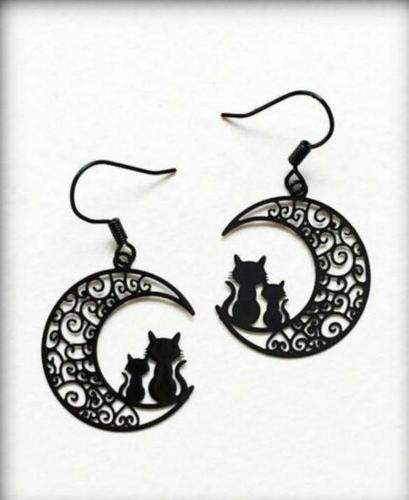 black cats sitting on crescent moon earrings
