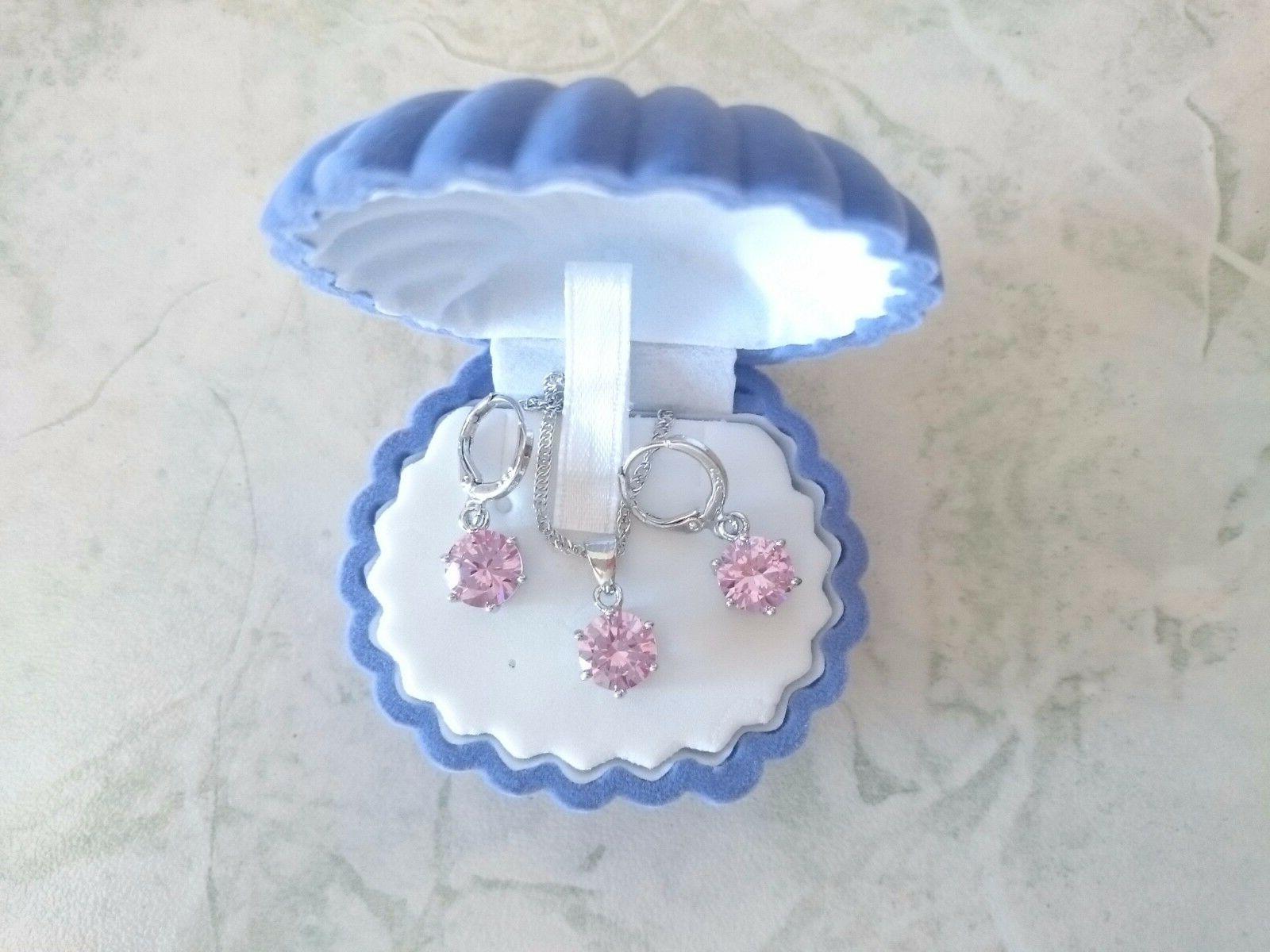 collana e orecchini parure con pietre rosa