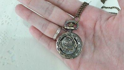 collana orologio rosa la bella e la