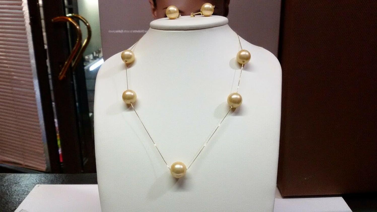 completo in oro giallo 18kt con perle