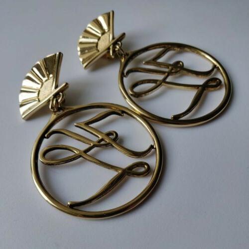 grandi orecchini a clip con monogramma vintage