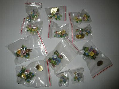 lotto stock orecchini e spille in ceramica