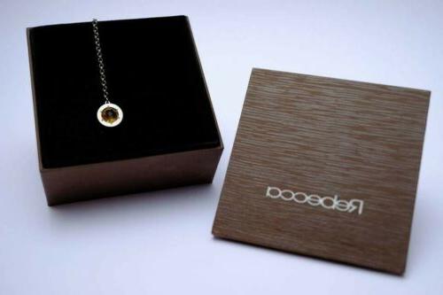 mono orecchini rebecca con topazio nuovo