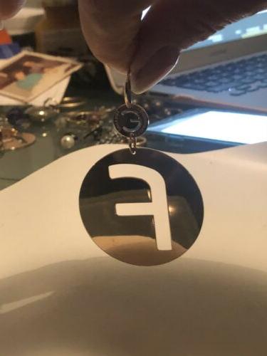 mono orecchino donna lettera f