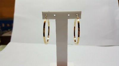 orecchini a cerchio a sezione quadrata in