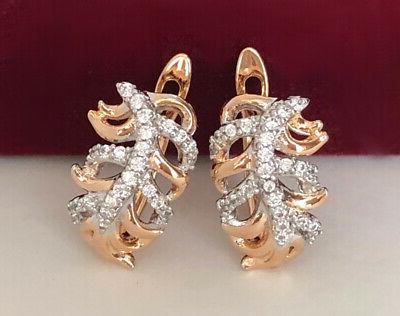 orecchini a cerchio piuma con cristalli swarovski