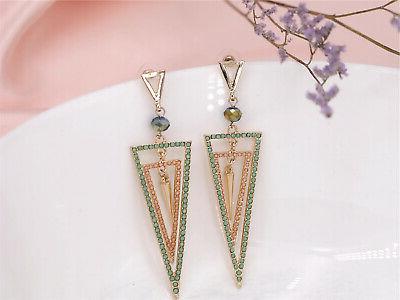 orecchini a perno dorato arte deco triangolo