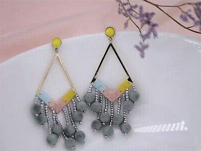 orecchini a perno dorato grandi lampadario triangolo