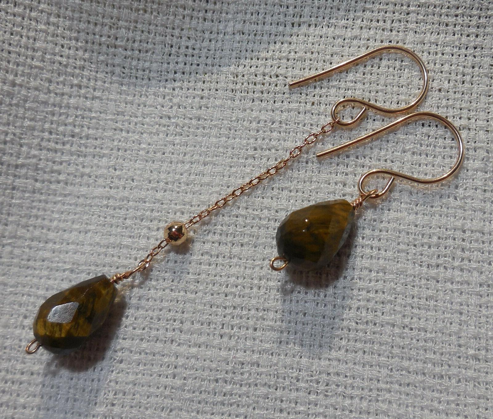 orecchini asimmetrici in bronzo e occhio di