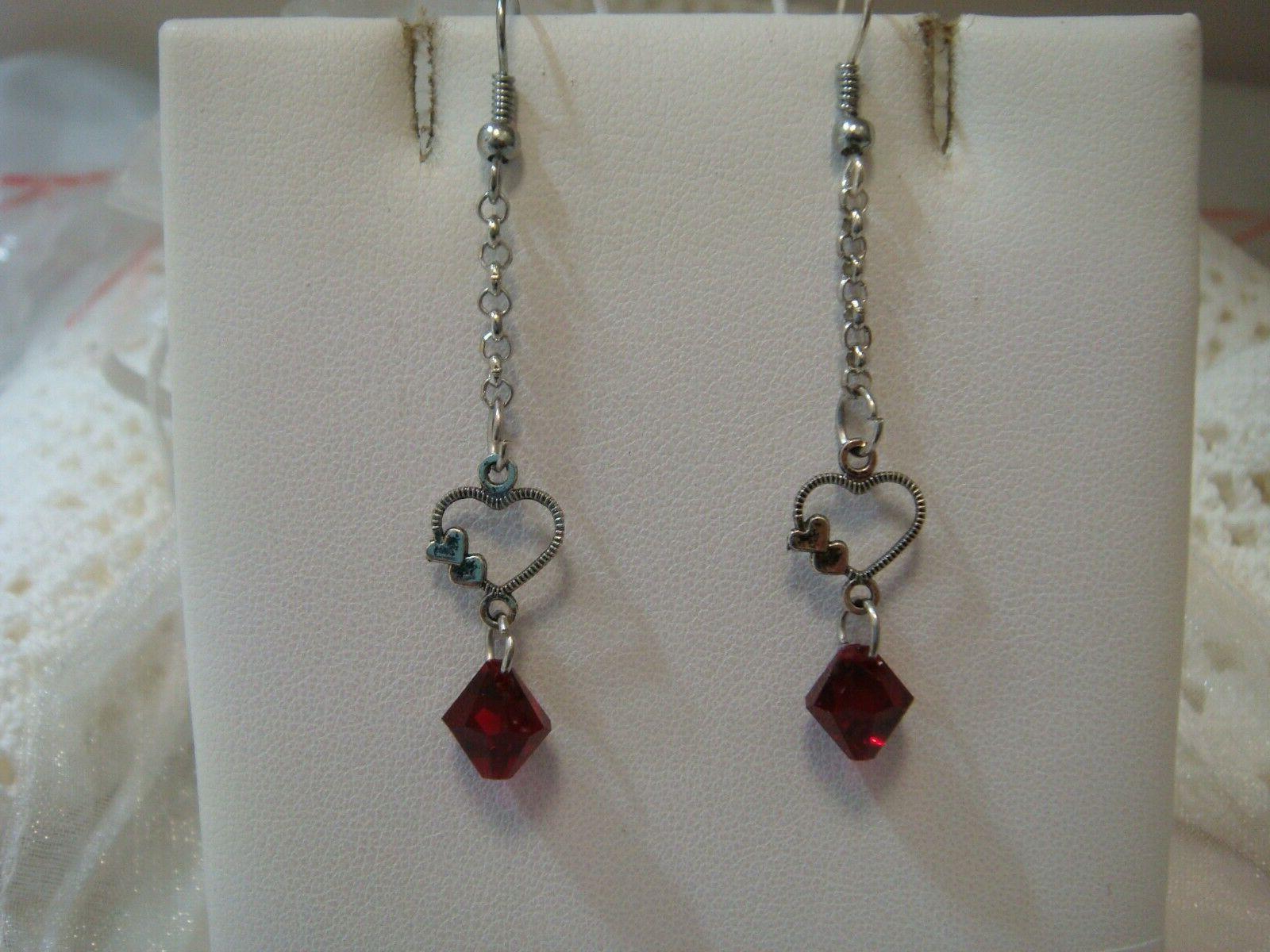 orecchini biconi swarovski rossi art 80