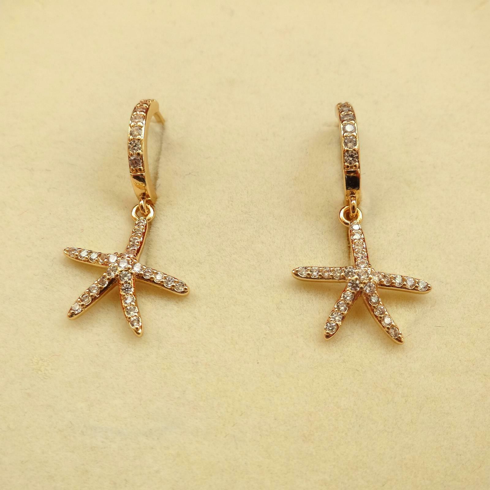 orecchini cerchi donna colore oro stella marina