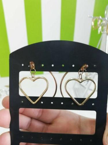 orecchini cerchi dorati con cuore