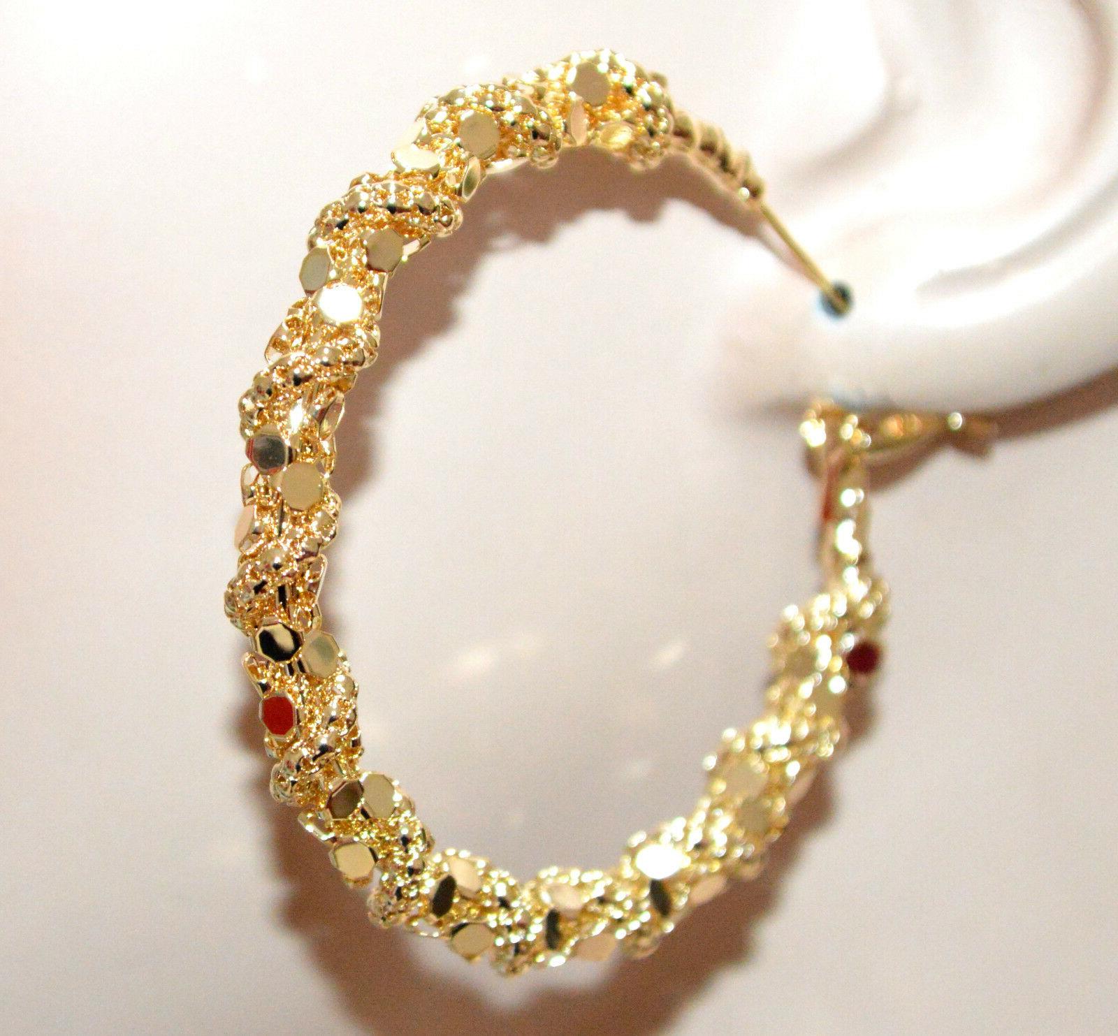 orecchini cerchi oro dorati donna intrecciati nido