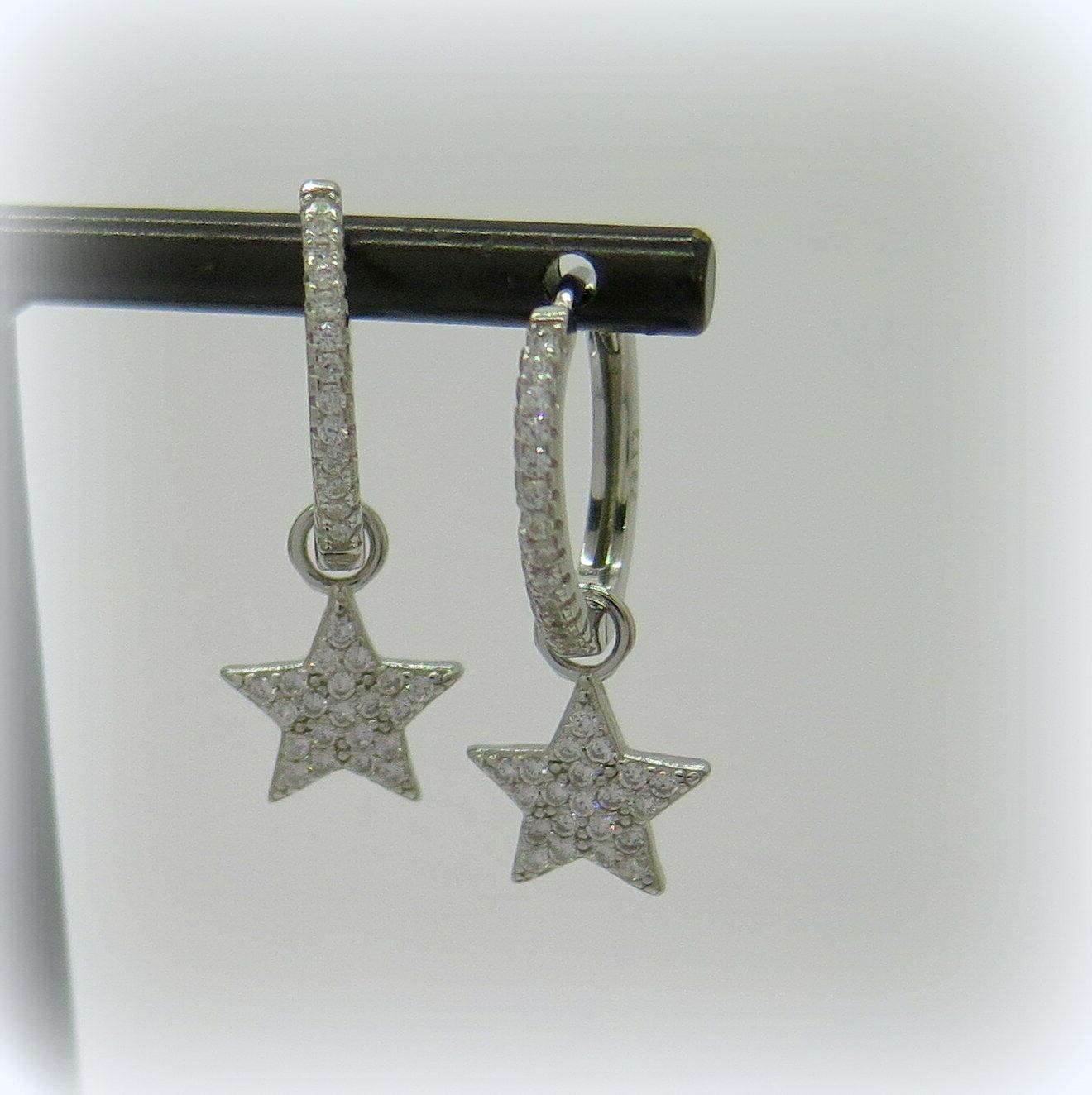orecchini cerchi pendenti stella in argento e