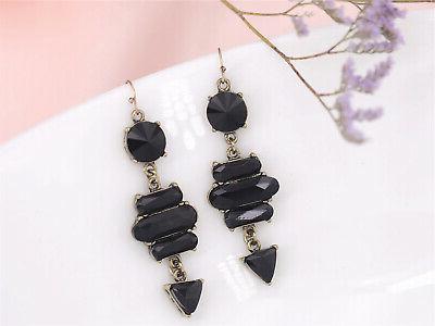 orecchini clip pinze dorato lampadario goccia triangolo