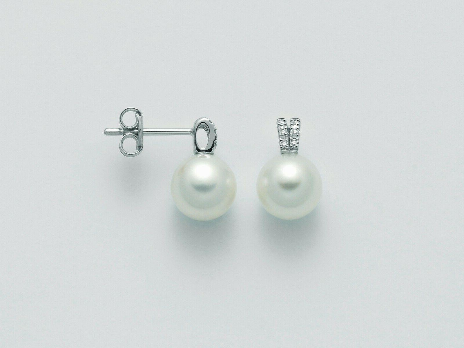 orecchini con perle e diamanti con montatura