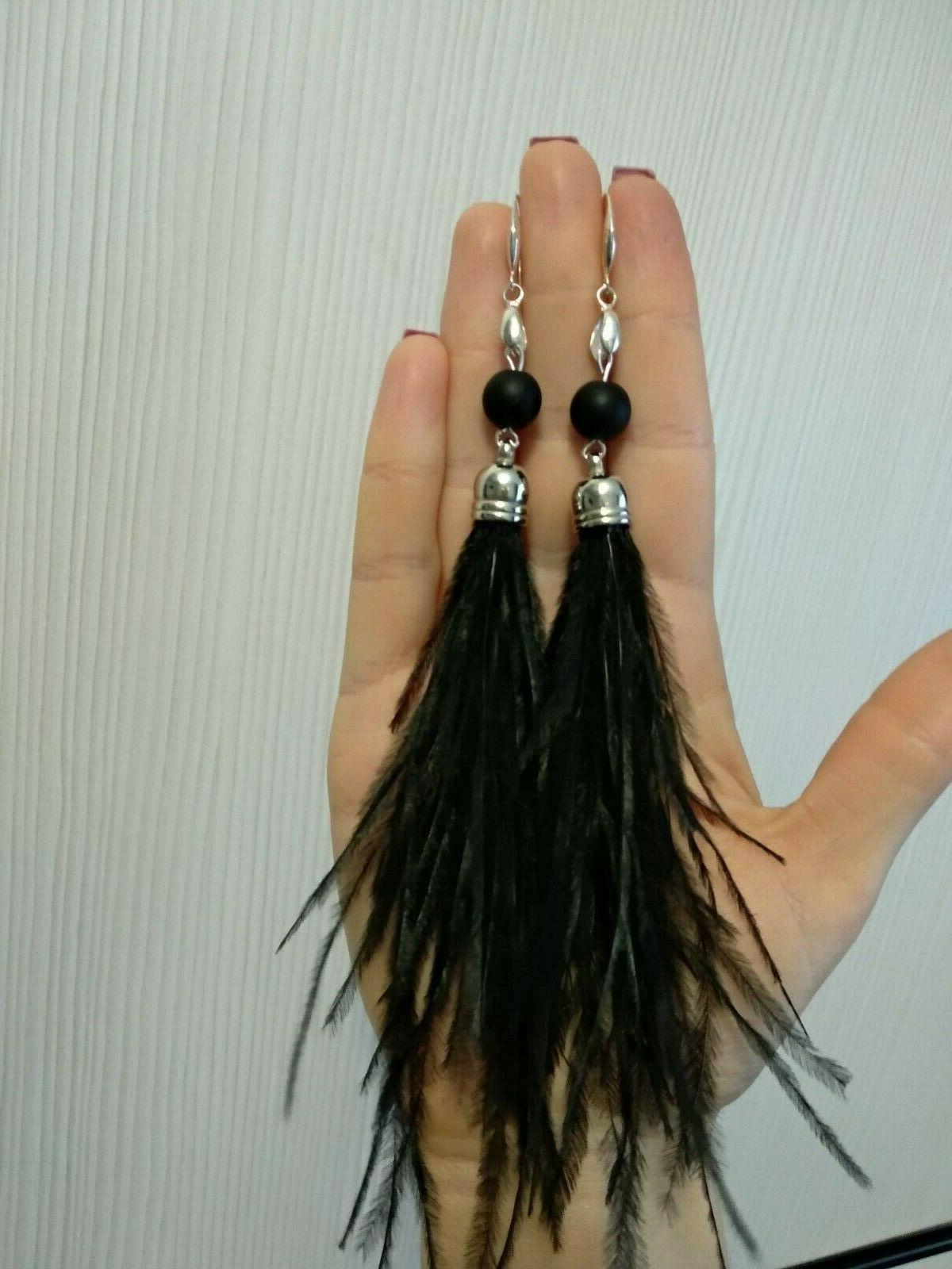 orecchini con piume di struzzo e chiusura