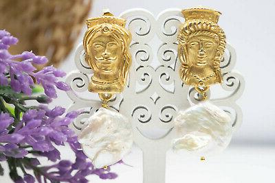 orecchini con teste di moro in ottone