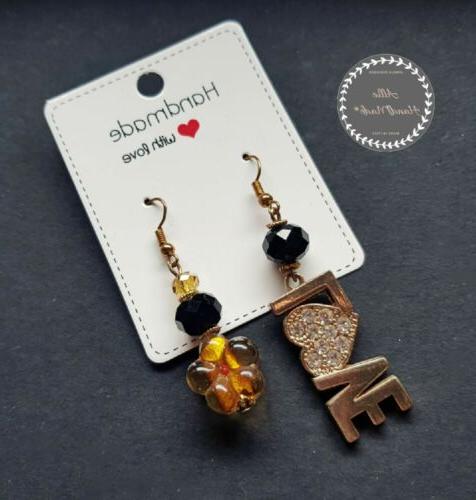 orecchini donna asimmetrici scritta love oro con