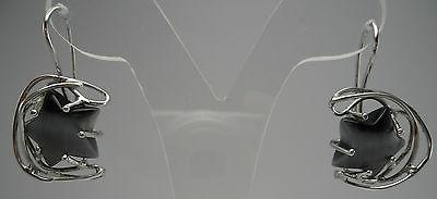 orecchini donna forma stella pietra nera e