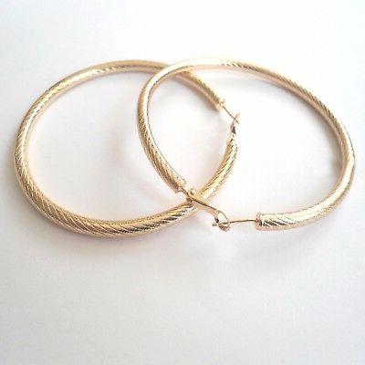 orecchini donna grandi cerchi rigati colore oro