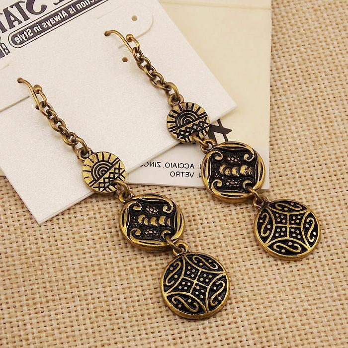 orecchini donna pendenti a forma di bottoni