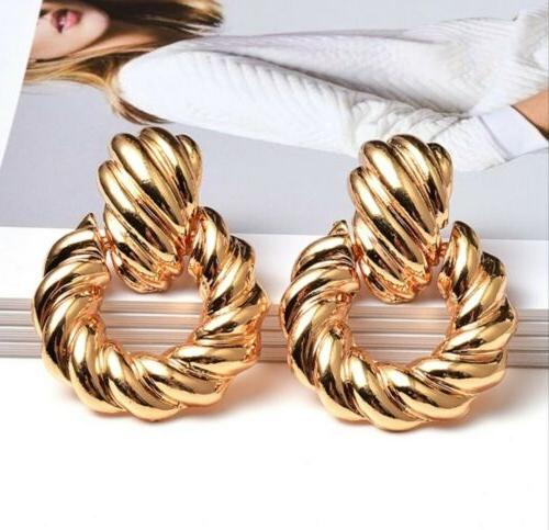 orecchini donna pendenti color oro intrecciati acciaio