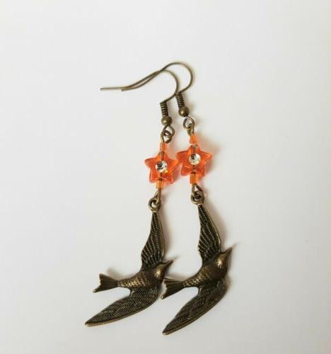 orecchini donna pendenti ucellino stella bronzo antico