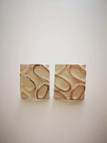 orecchini donna rettangolari con perfili argentati che