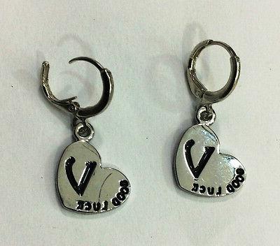 orecchini earrings coppia cerchietti color acciaio ciondolo