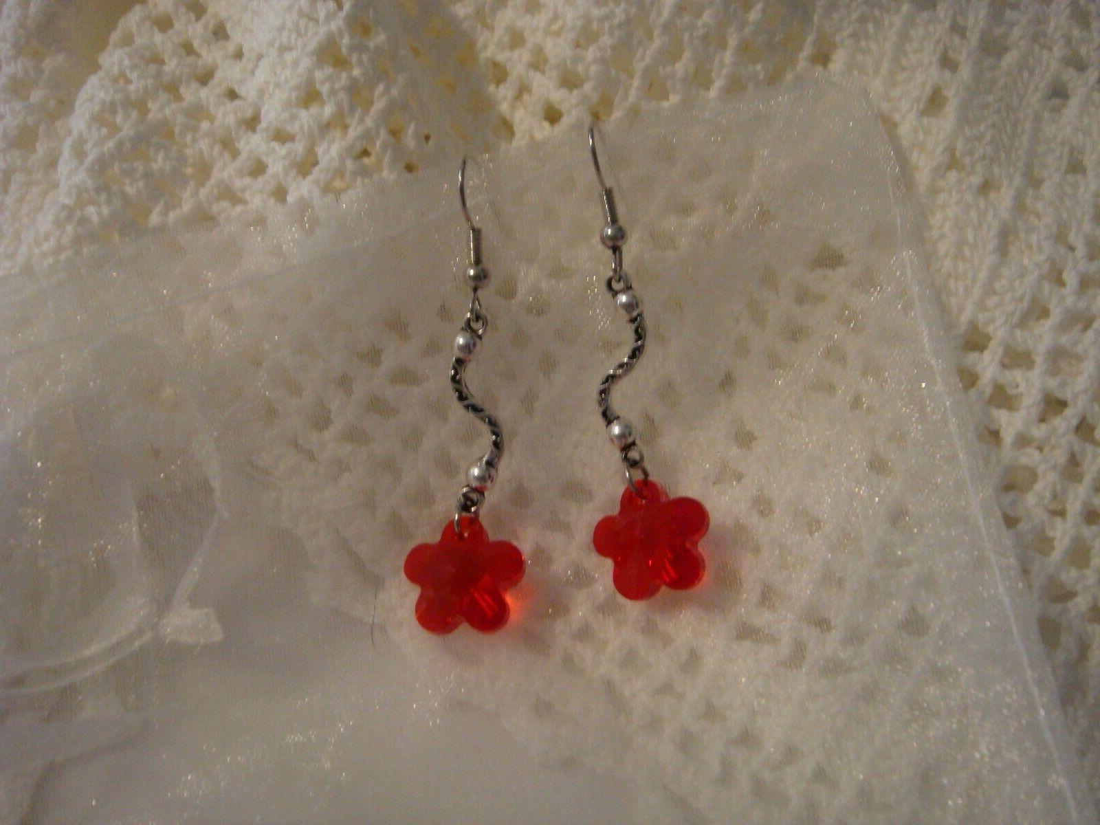 orecchini fiore swarovski rossi art 84