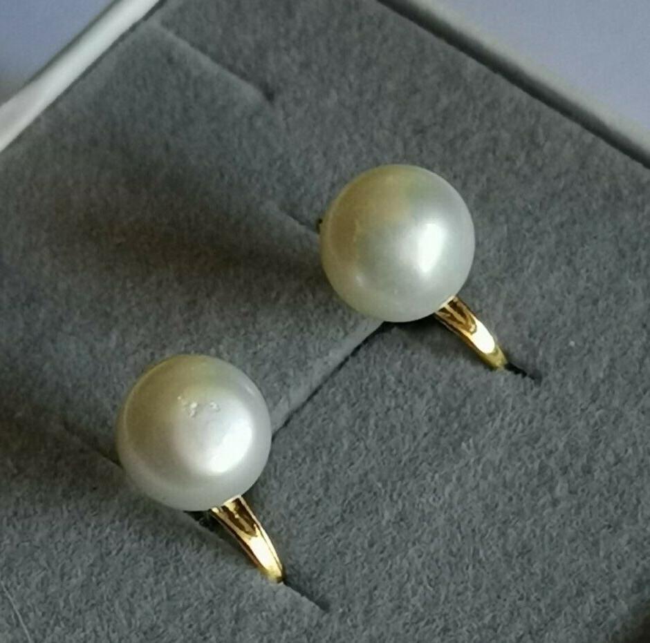 orecchini in acciaio color oro con perla