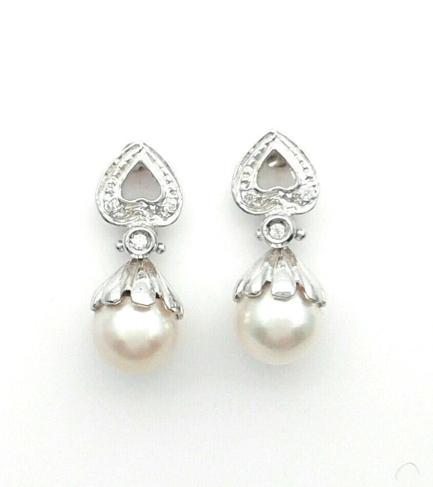orecchini in oro bianco 18 ct zirconi