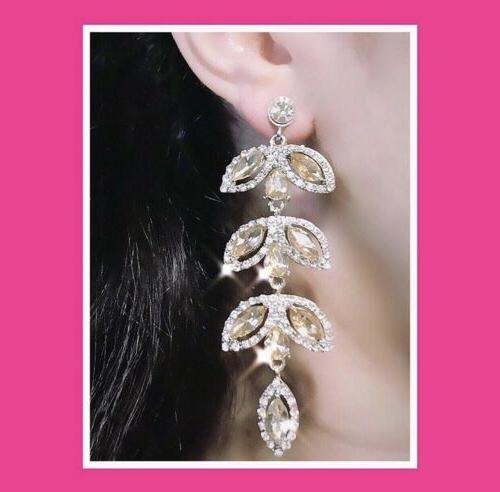 orecchini lunghi con gemme effetto cristallo in