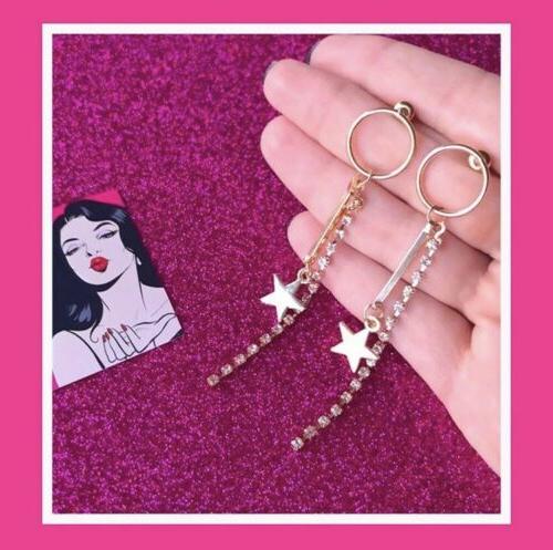 orecchini lunghi con stelle in color oro