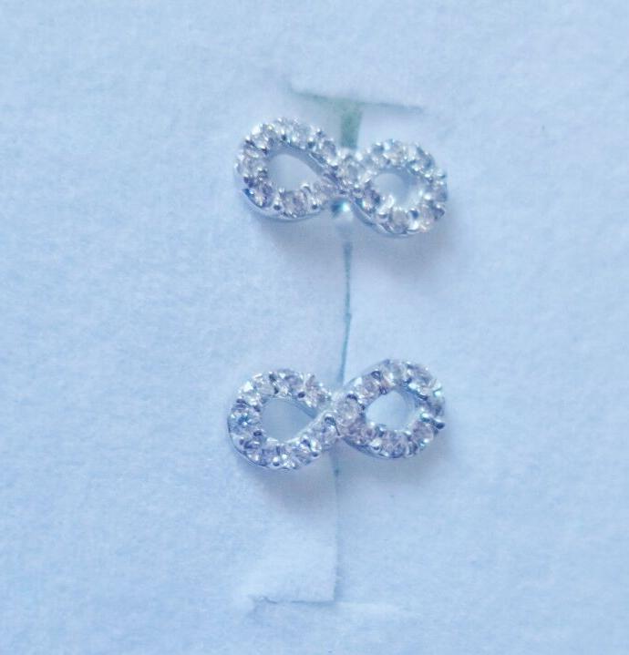 orecchini oro bianco 18k 750 infinito zirconi