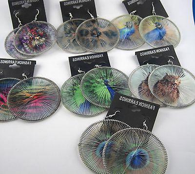 orecchini pendenti grande tondo tessile fatto a