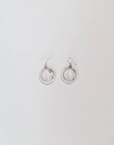 orecchini pendenti in acciaio luna con brillantini