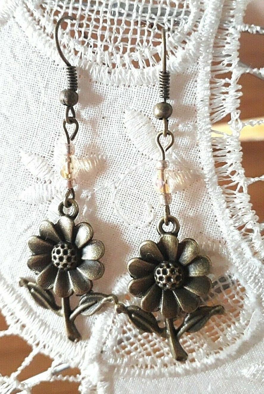 orecchini pendenti in lega color bronzo con