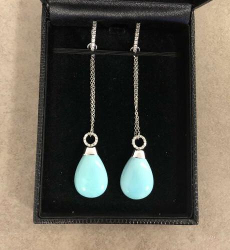 orecchini pendenti in oro bianco con diamanti