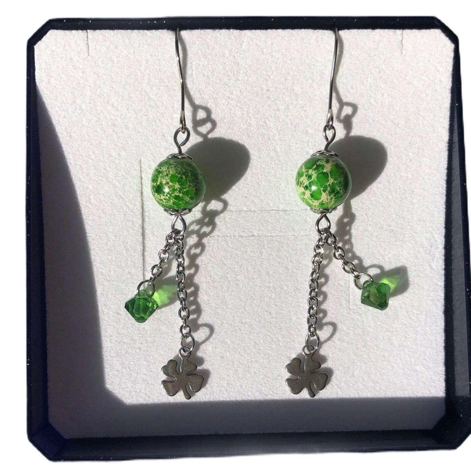 orecchini pendenti quadrifoglio acciaio inox cristalli swaro