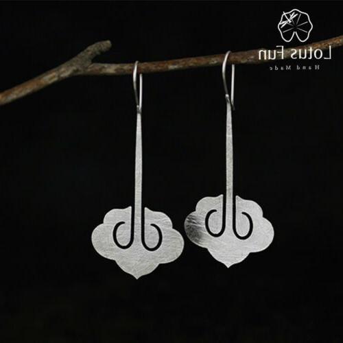 orecchini pendenti unici oro 18k con nuvola