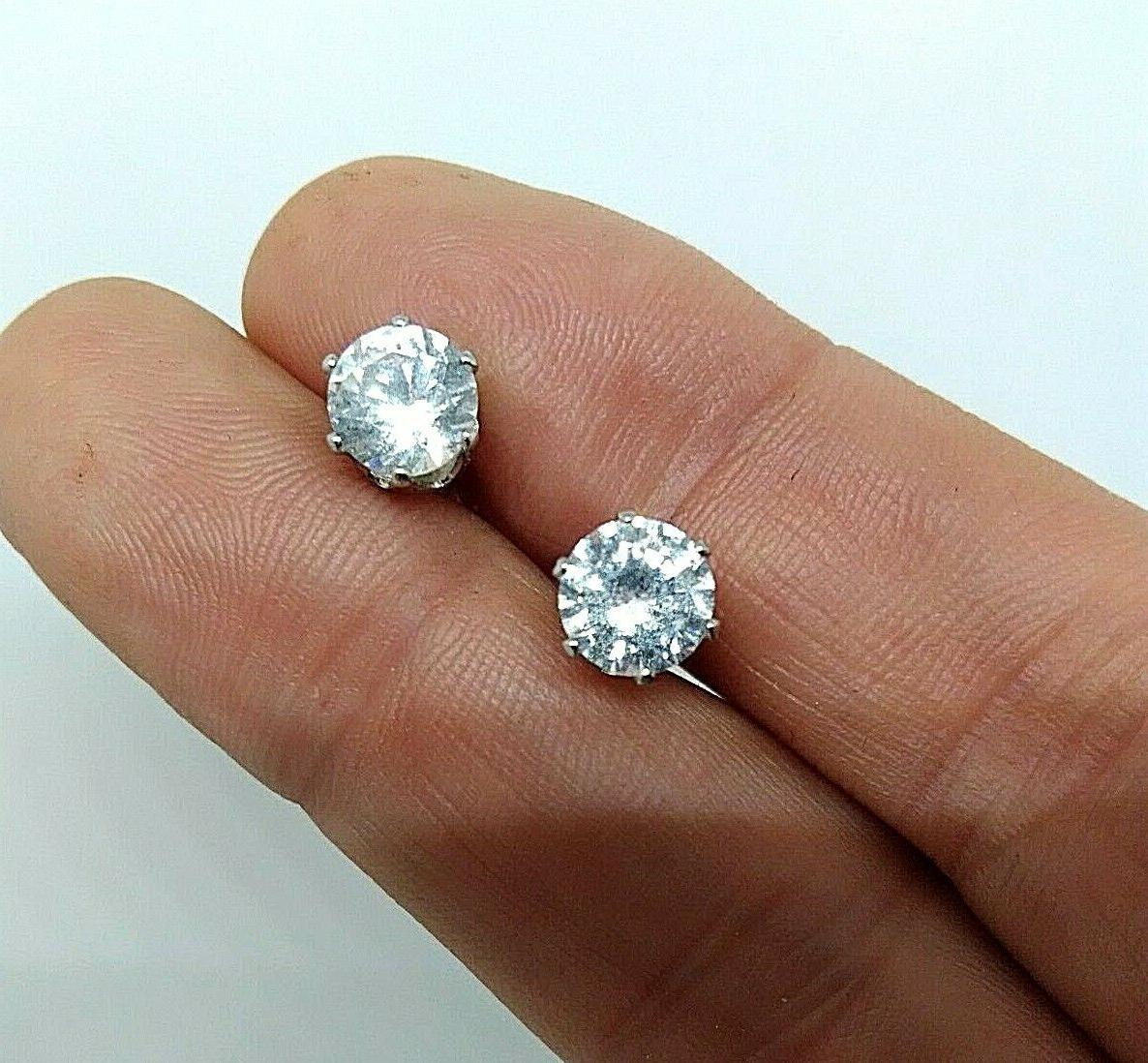 orecchini punto luce bianco in acciaio per