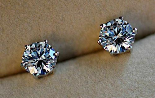 orecchini punto luce in acciaio inox unisex