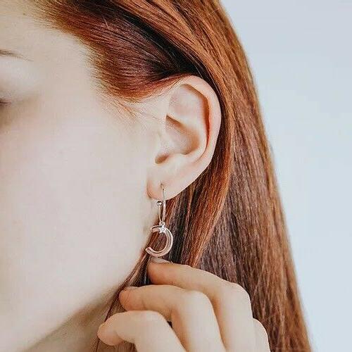 orecchini stella lettera argento e zirconi