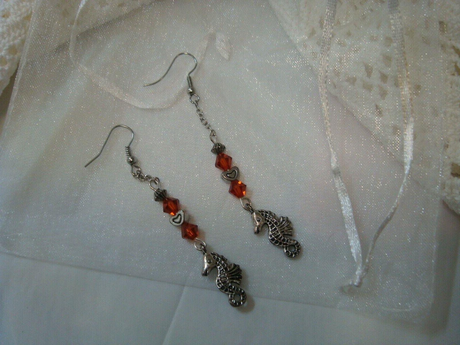 orecchini swarovski rosso india e cavallucci marini